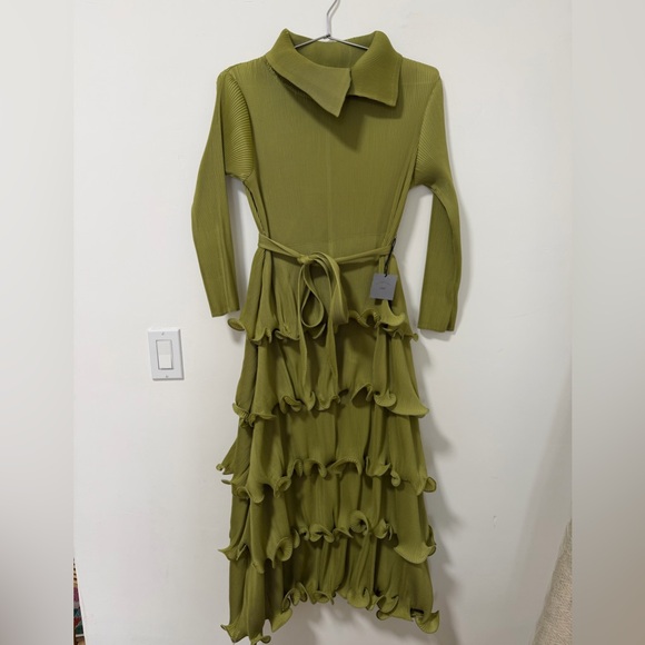 Long pleated dress with multi-layer cascading ruffles in a green color